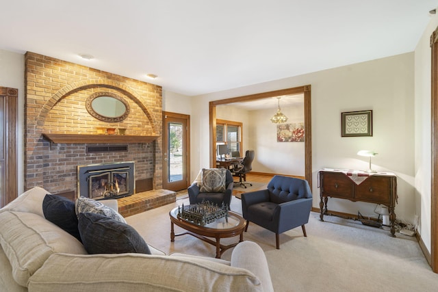 living room featuring light colored carpet and a brick fireplace