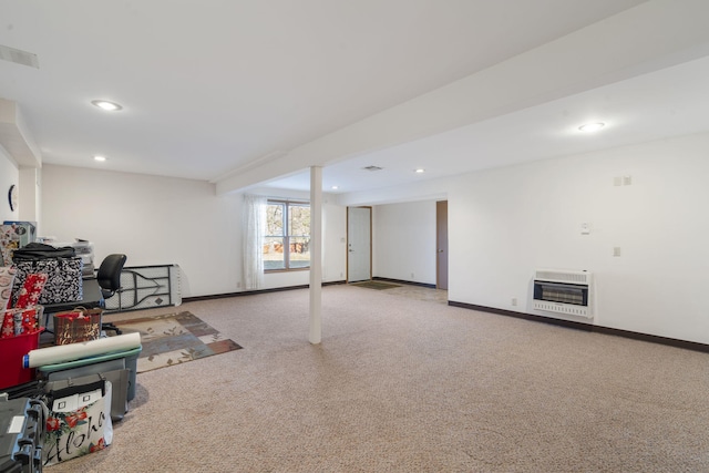 basement with carpet floors and heating unit