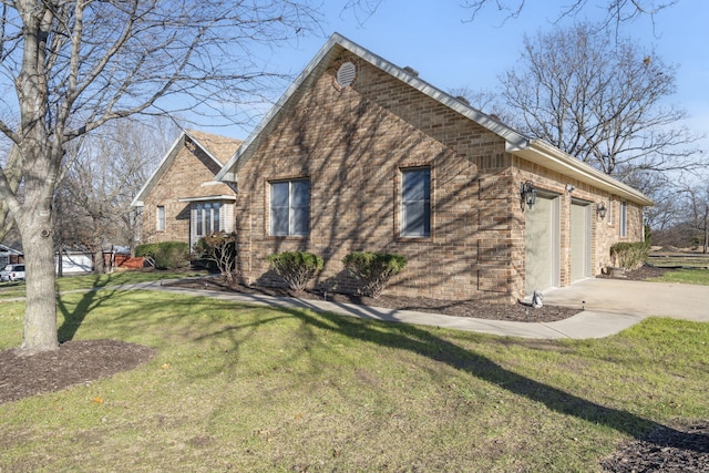 view of side of home with a garage and a lawn