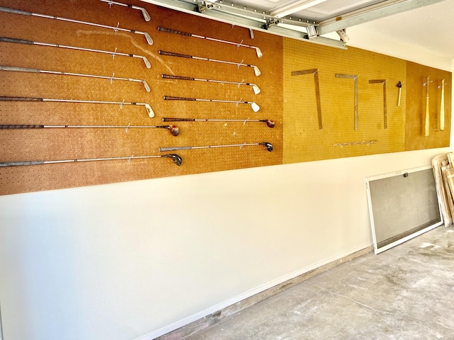 garage featuring baseboards