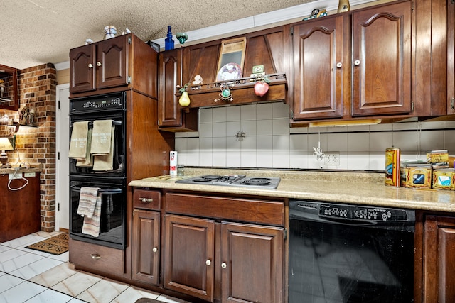 kitchen with double oven, decorative backsplash, stainless steel gas cooktop, and a textured ceiling