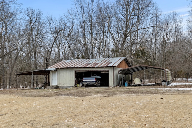 exterior space featuring a garage and a carport