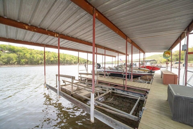 dock area featuring a water view