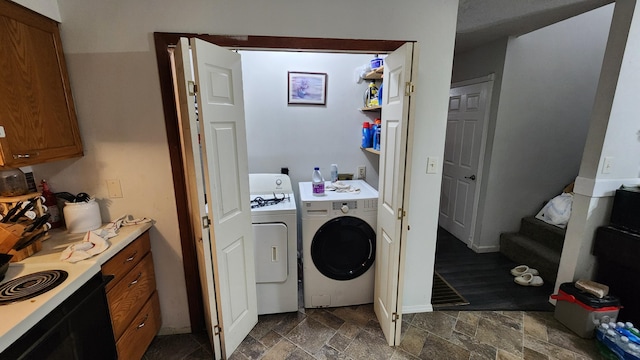 laundry room featuring separate washer and dryer