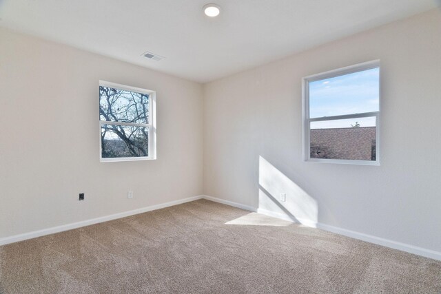 view of carpeted spare room