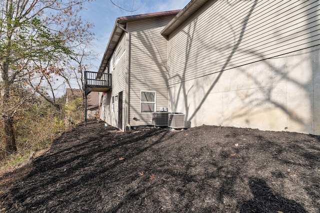 view of property exterior with central air condition unit