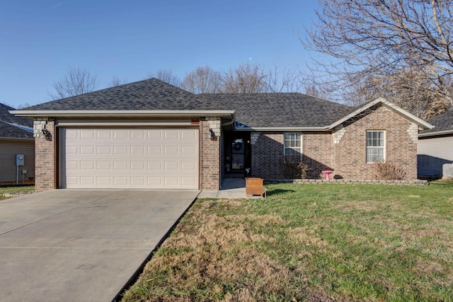 ranch-style house featuring a garage and a front lawn