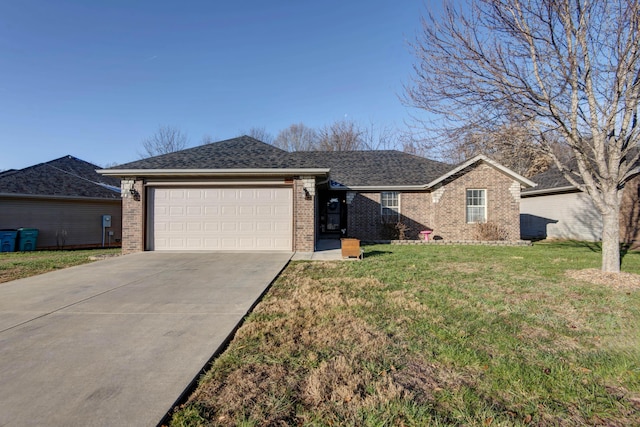 ranch-style house with a front yard and a garage