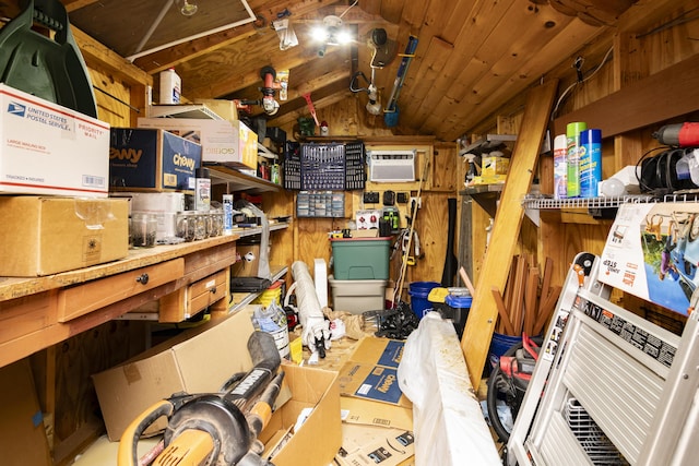 storage room featuring a wall mounted air conditioner