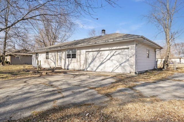 exterior space with a garage