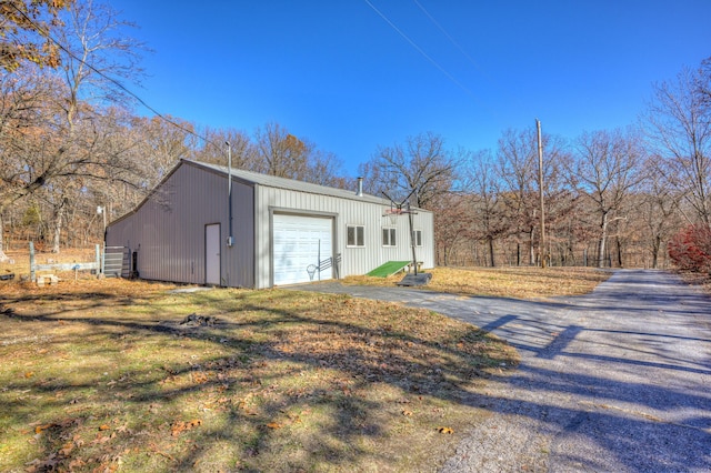 view of outbuilding with a garage