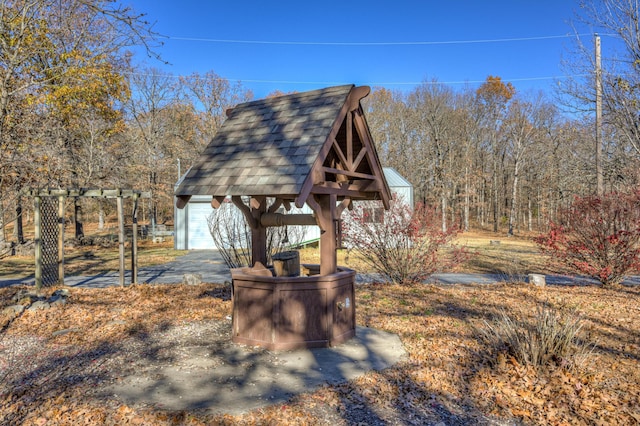 view of home's community featuring an outdoor structure