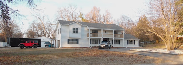 front of property with a balcony