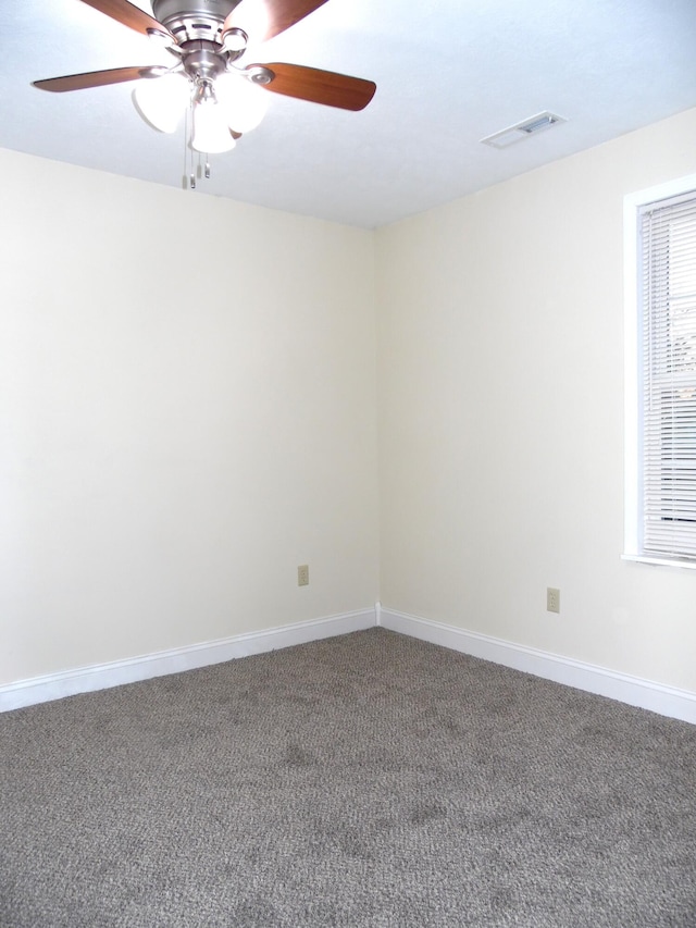 unfurnished room featuring carpet flooring and ceiling fan