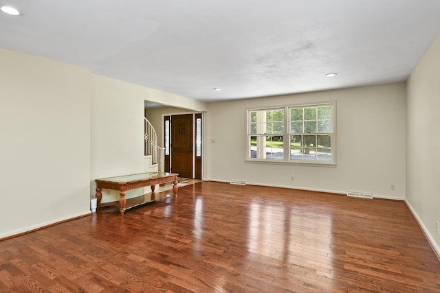 3011 E Lamonta Dr, Springfield, MO 65804 - unfurnished room featuring wood finished floors and recessed lighting
