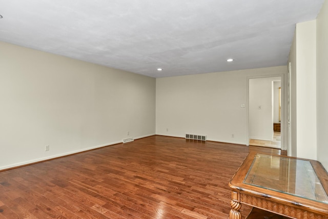 3011 E Lamonta Dr, Springfield, MO 65804 - spare room with wood finished floors and recessed lighting