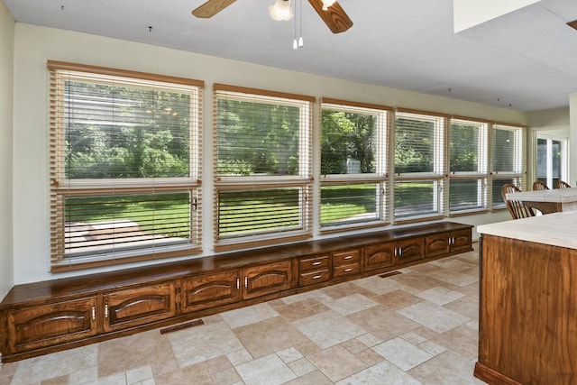 3011 E Lamonta Dr, Springfield, MO 65804 - unfurnished sunroom with stone finish flooring