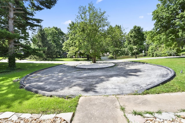 3011 E Lamonta Dr, Springfield, MO 65804 - view of home's community with a yard and view of wooded area