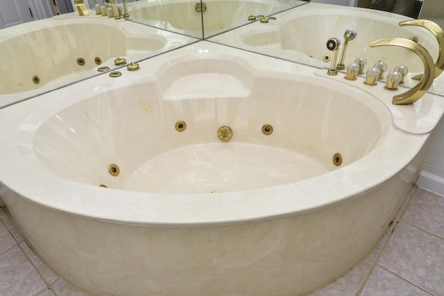 3011 E Lamonta Dr, Springfield, MO 65804 - bathroom with tile patterned flooring and a jetted tub