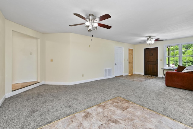 3011 E Lamonta Dr, Springfield, MO 65804 - unfurnished living room with ceiling fan and carpet flooring