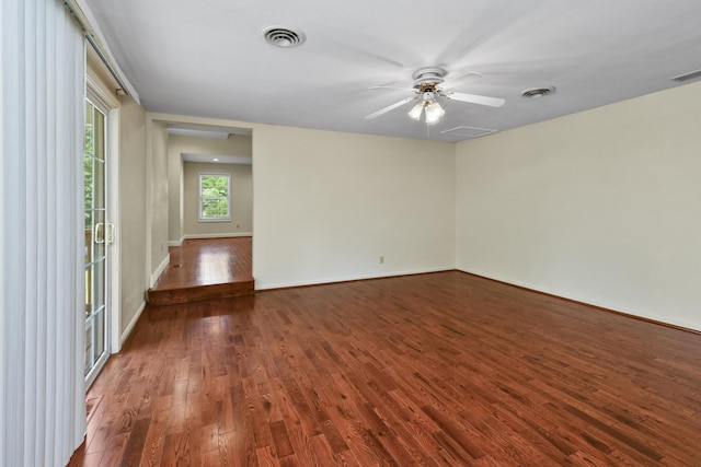 3011 E Lamonta Dr, Springfield, MO 65804 - empty room with wood finished floors and a ceiling fan