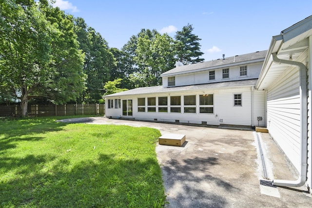 3011 E Lamonta Dr, Springfield, MO 65804 - back of property with a patio and a shingled roof