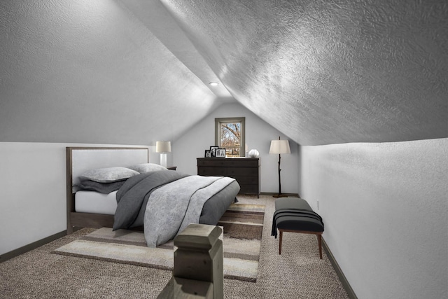 carpeted bedroom with lofted ceiling and a textured ceiling