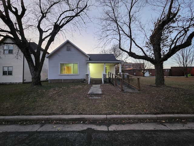 view of front of property featuring covered porch