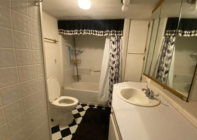 full bathroom featuring shower / bath combination with curtain, toilet, tile walls, and vanity