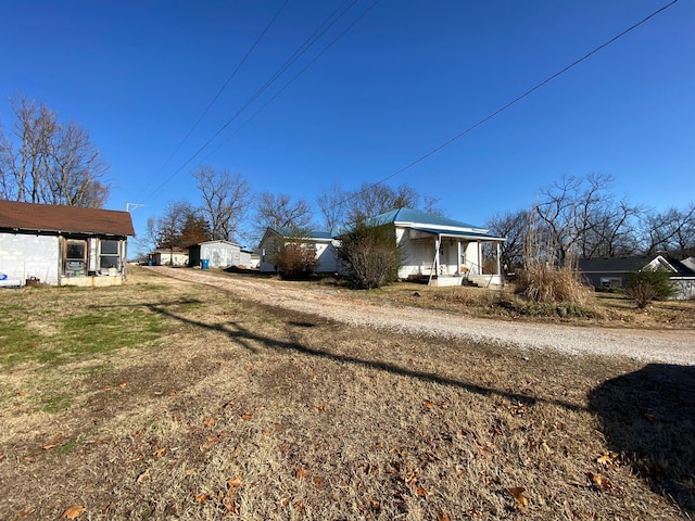 view of home's exterior featuring a porch