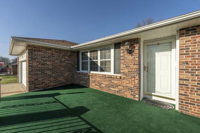 property entrance with a garage