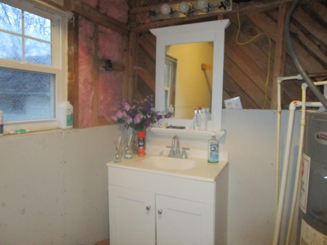 bathroom with sink and water heater