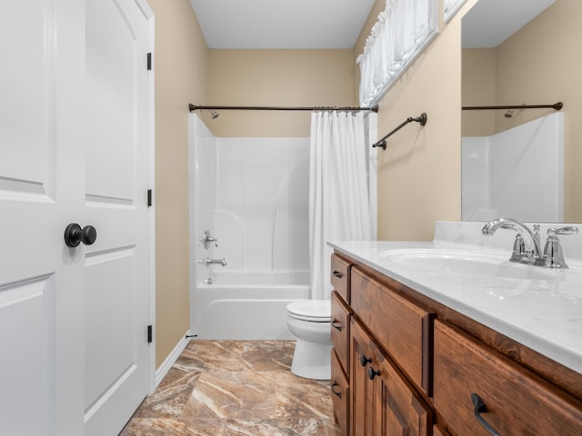 full bathroom featuring shower / bath combo with shower curtain, vanity, and toilet