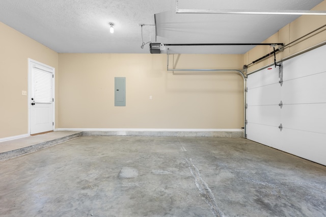 garage featuring electric panel and a garage door opener