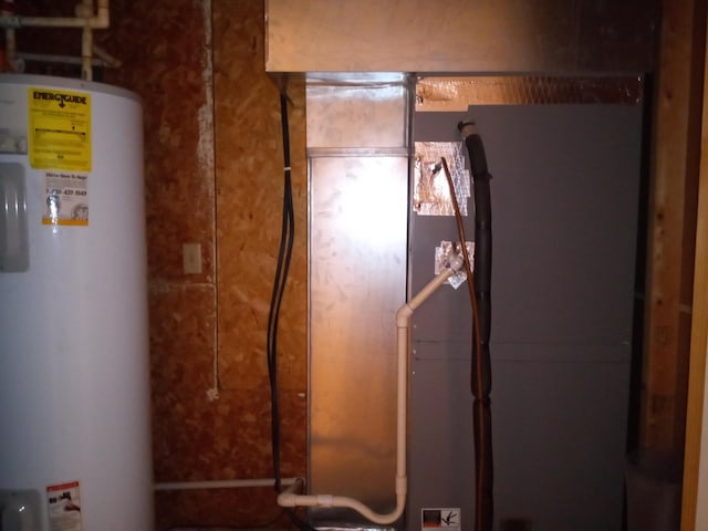 utility room with gas water heater