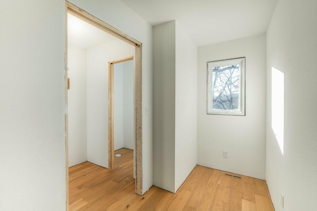 corridor featuring light wood-type flooring