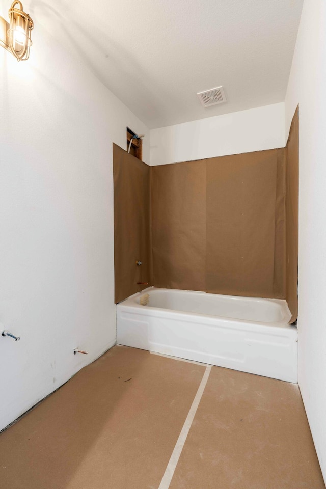 bathroom with a washtub