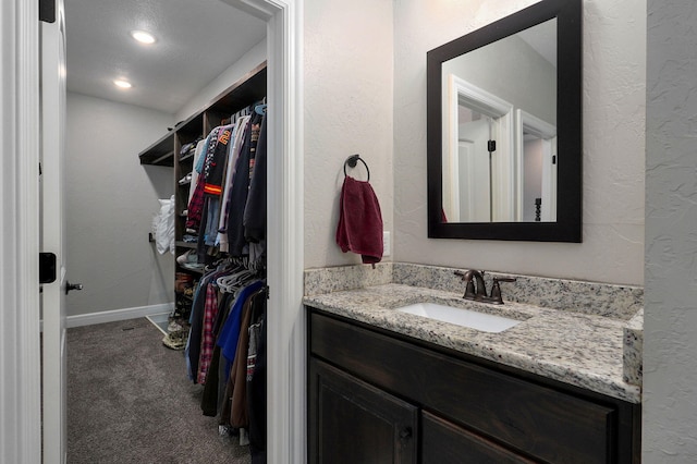 bathroom featuring vanity