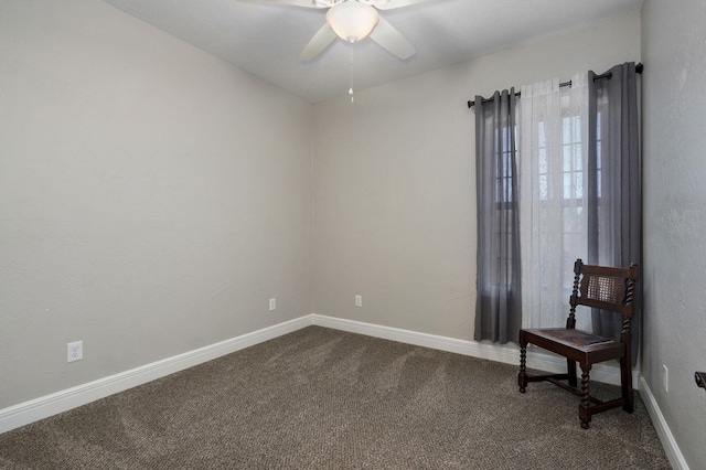 spare room with ceiling fan and carpet floors