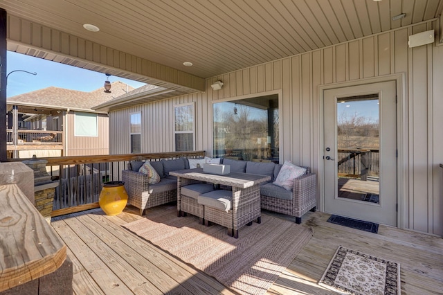 wooden deck with outdoor lounge area