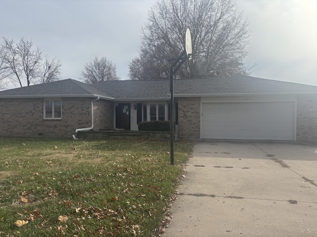 single story home featuring a front lawn and a garage