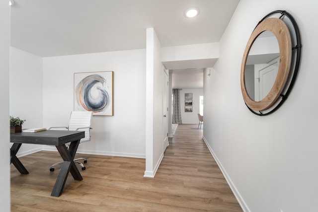 home office featuring light hardwood / wood-style floors