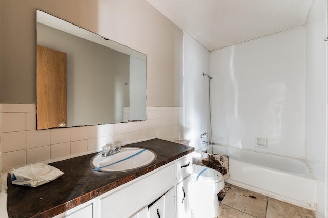 full bathroom featuring vanity, shower / tub combination, decorative backsplash, toilet, and a textured ceiling