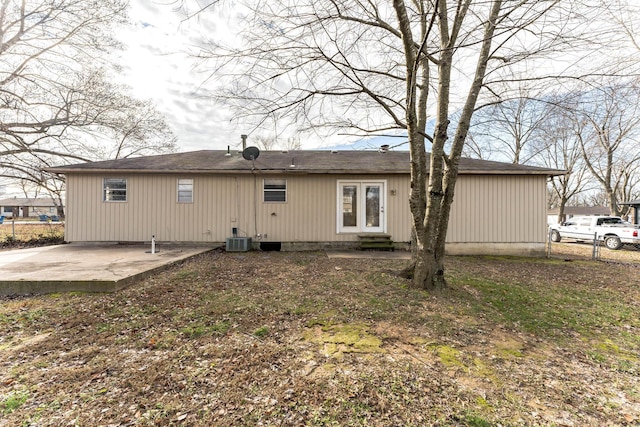 back of house featuring central air condition unit and a patio area