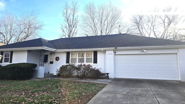 single story home featuring a garage