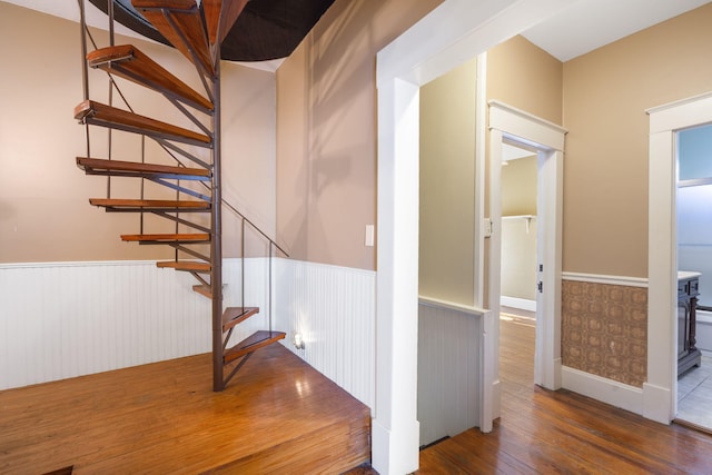 stairs with wood-type flooring