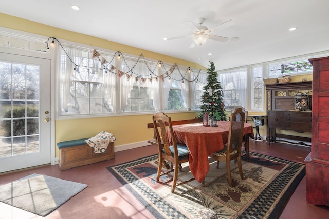 dining space with ceiling fan and a healthy amount of sunlight