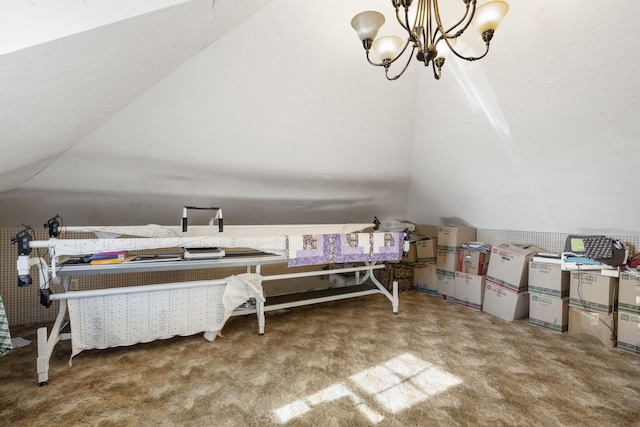 interior space featuring carpet floors and a notable chandelier