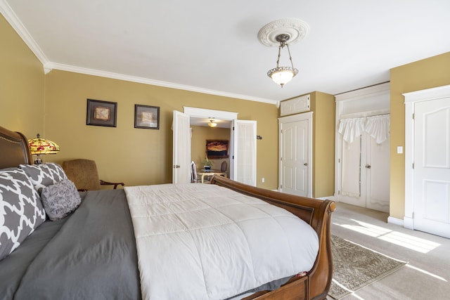 bedroom featuring carpet flooring and crown molding