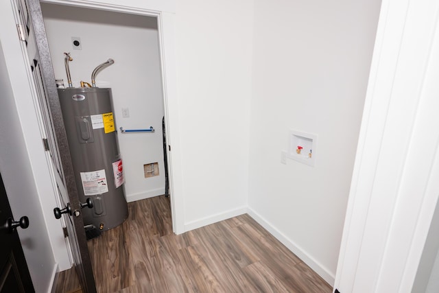 utility room with water heater